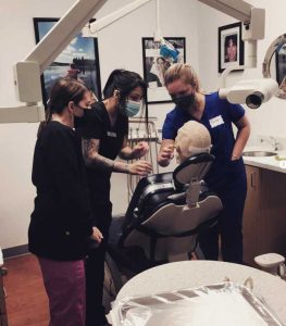 dental assistant students taking radiographs